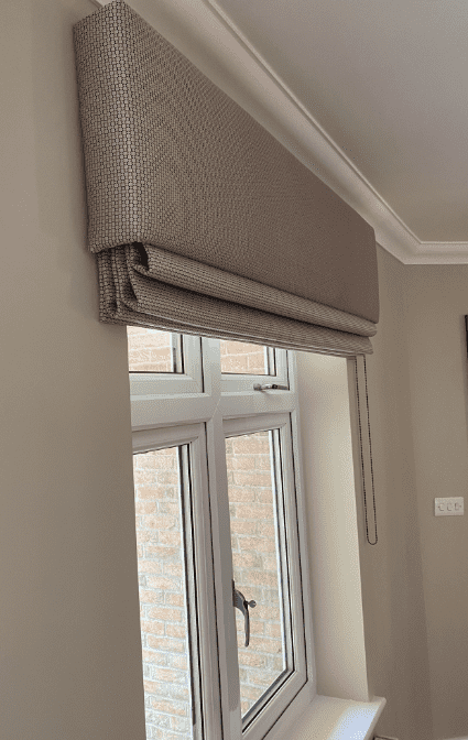 Hallway with herringbone flooring and neutral blinds